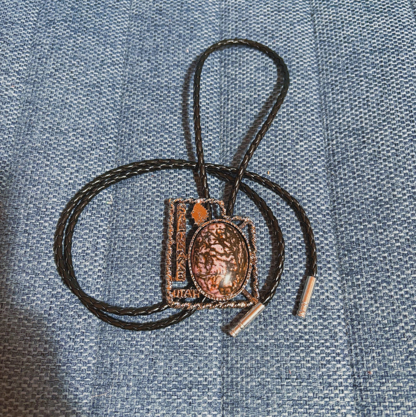 102 Matrix Rhodonite Bolo Tie - “Black Spur”
