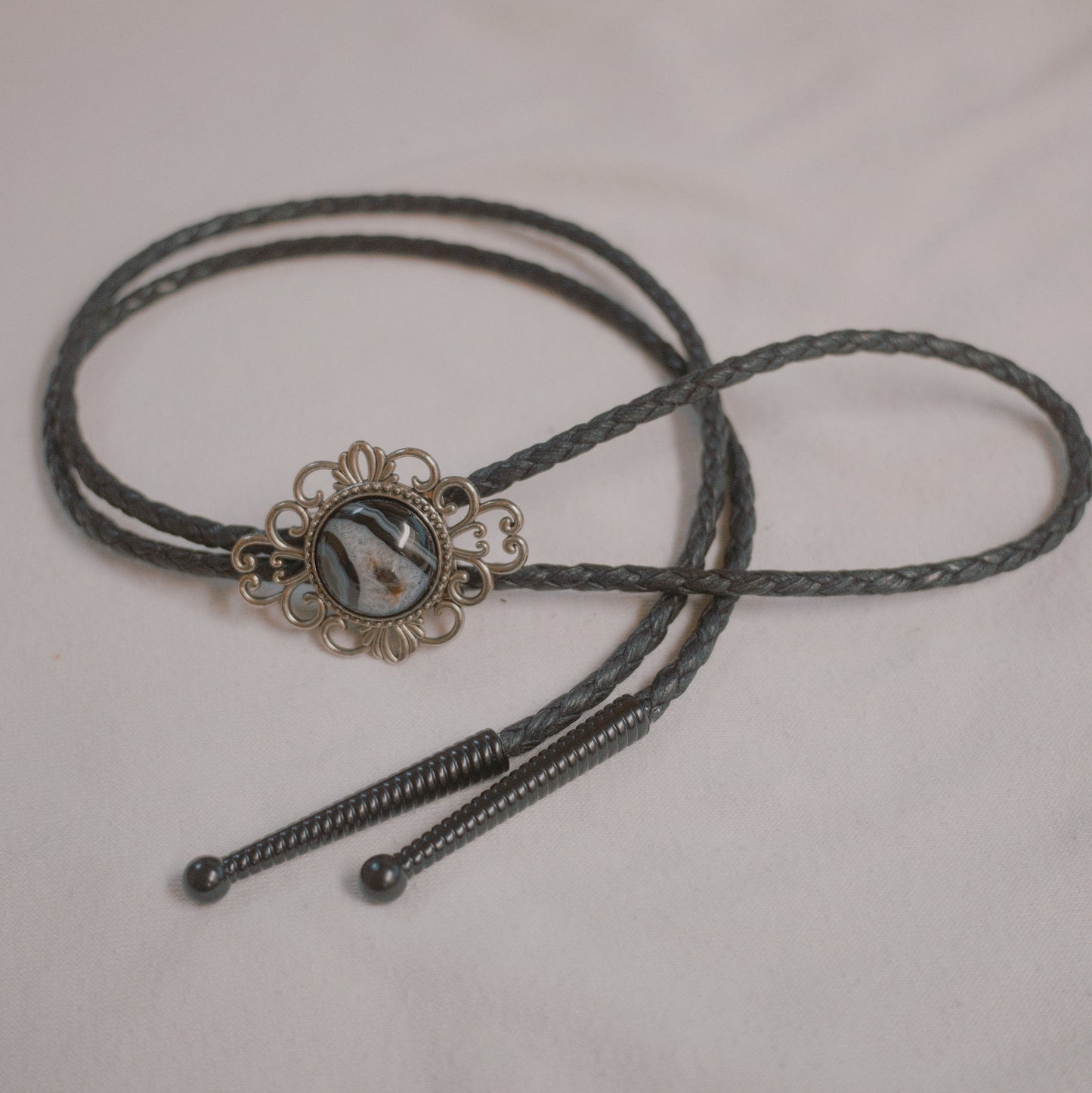 133 Black Banded Agate Bolo Tie - “Nocturne Spur”