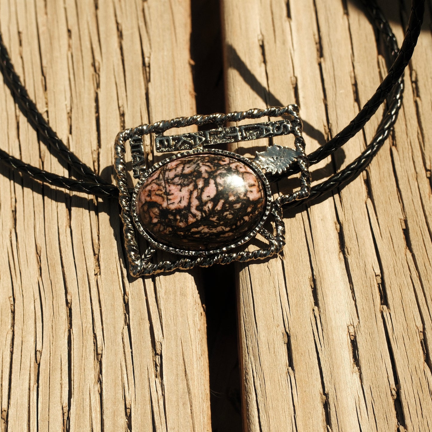 102 Matrix Rhodonite Bolo Tie - “Black Spur”