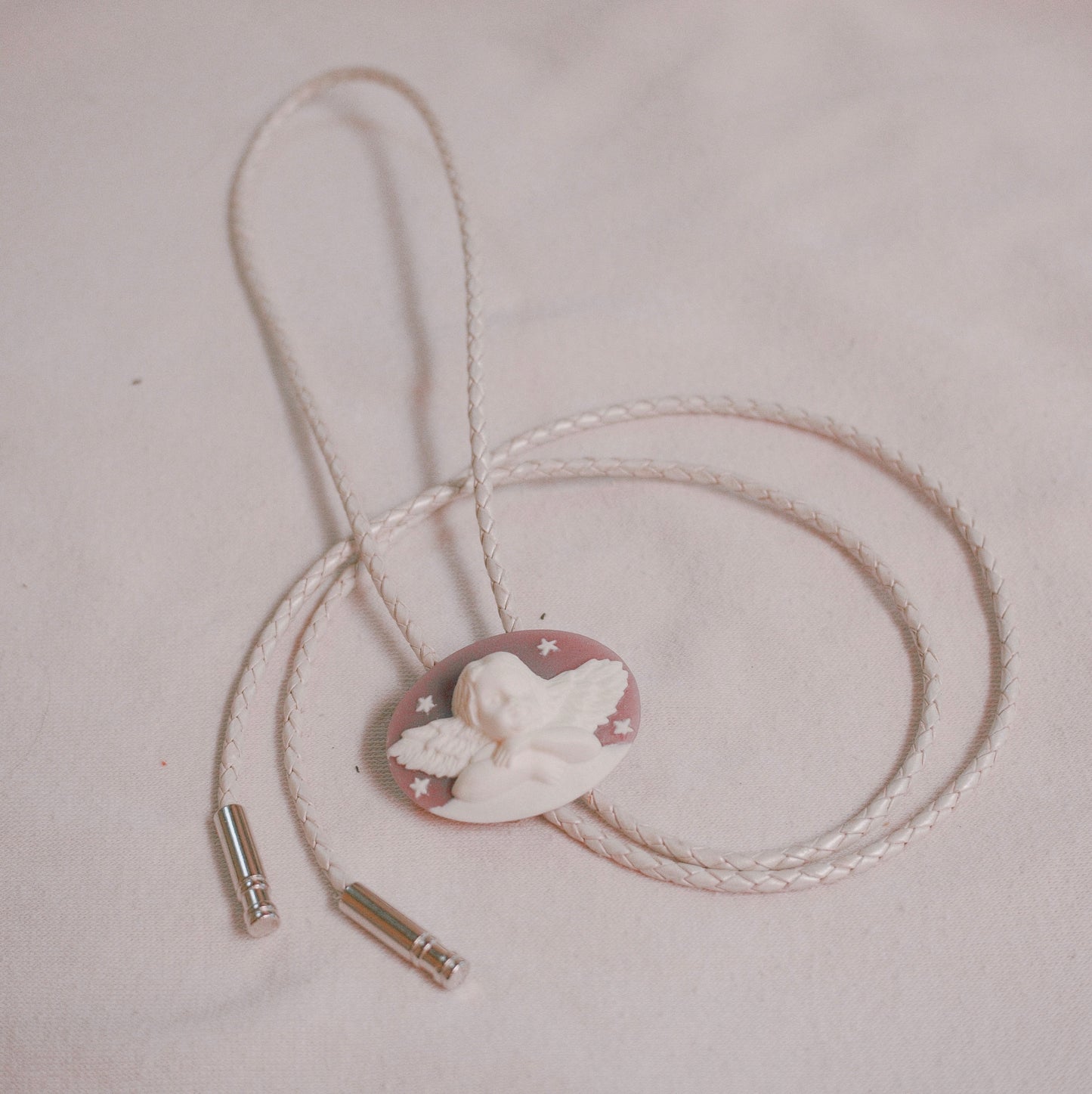 143 Vintage 1940s Cameo Bolo Tie - “Divine Mischief”