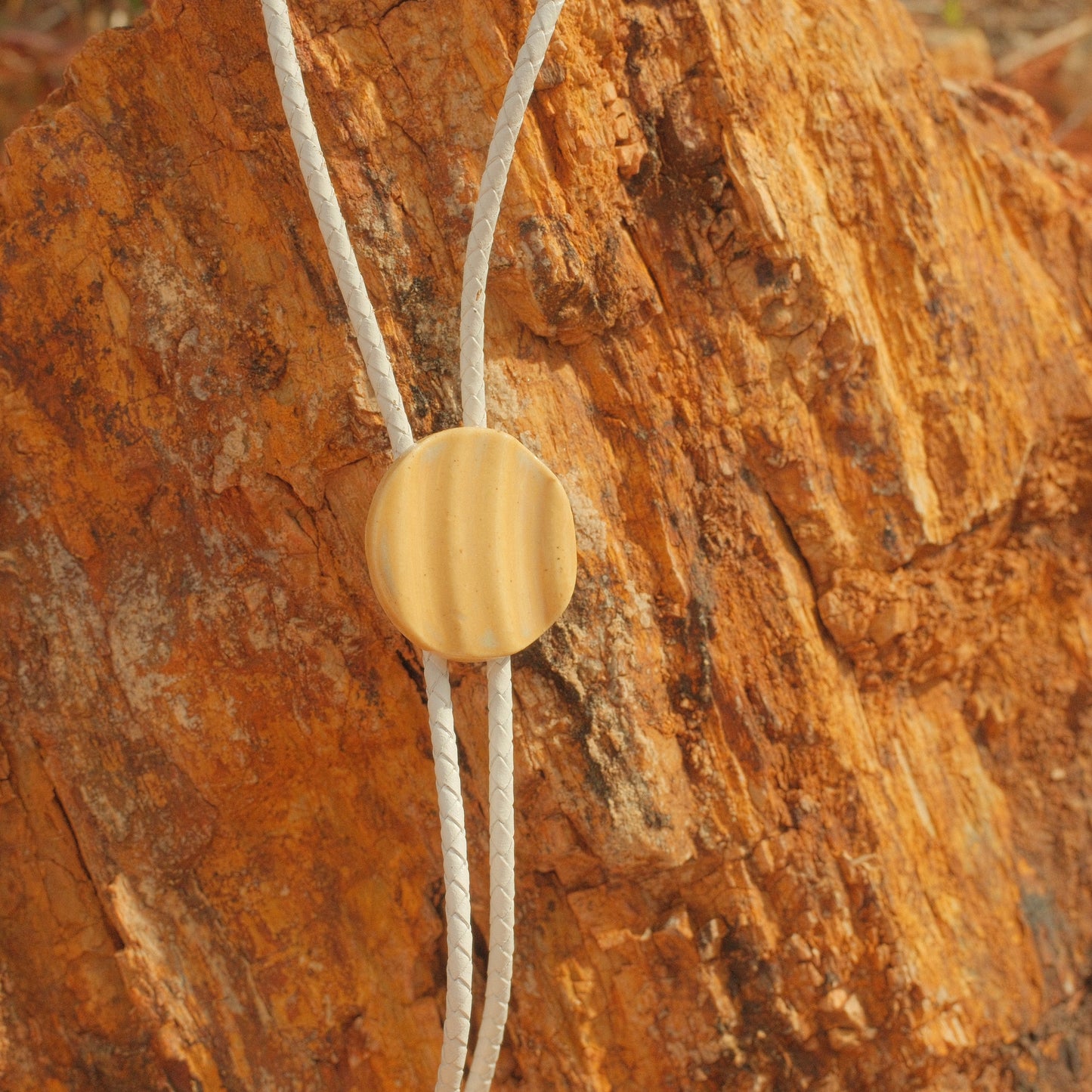 218 Hand-thrown Ceramic Bolo Tie - “Sun Token”