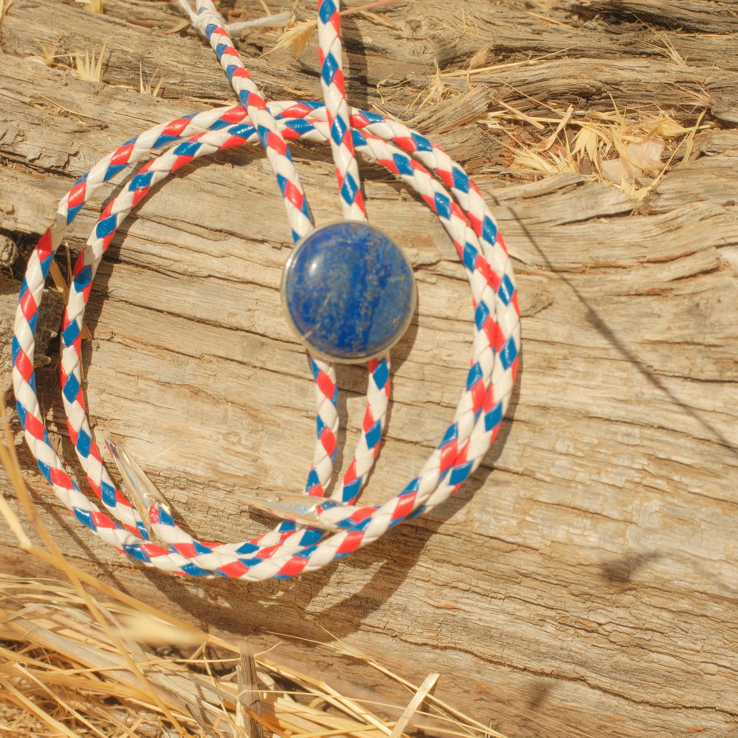 402 Sodalite Bolo Tie - “Firecracker Heart”