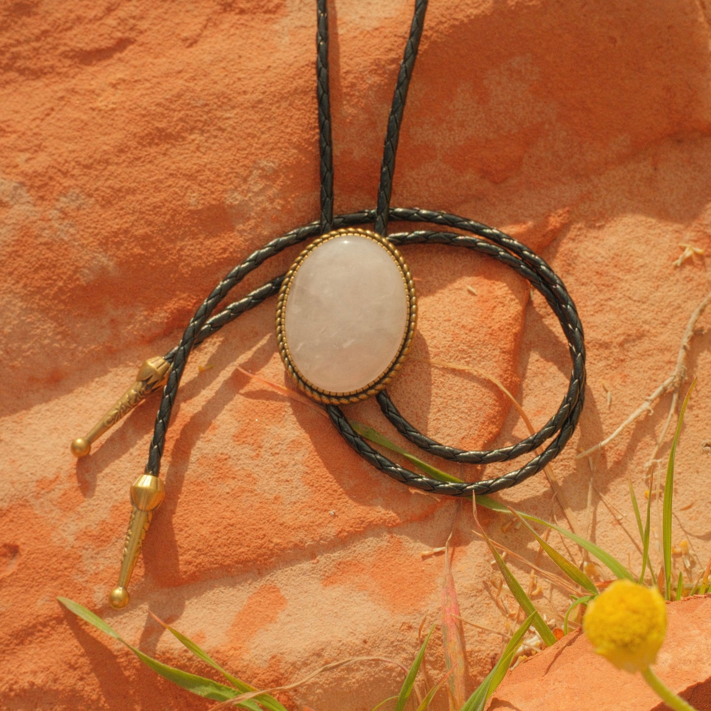 223 White Quartz Bolo Tie - “Black Halo”