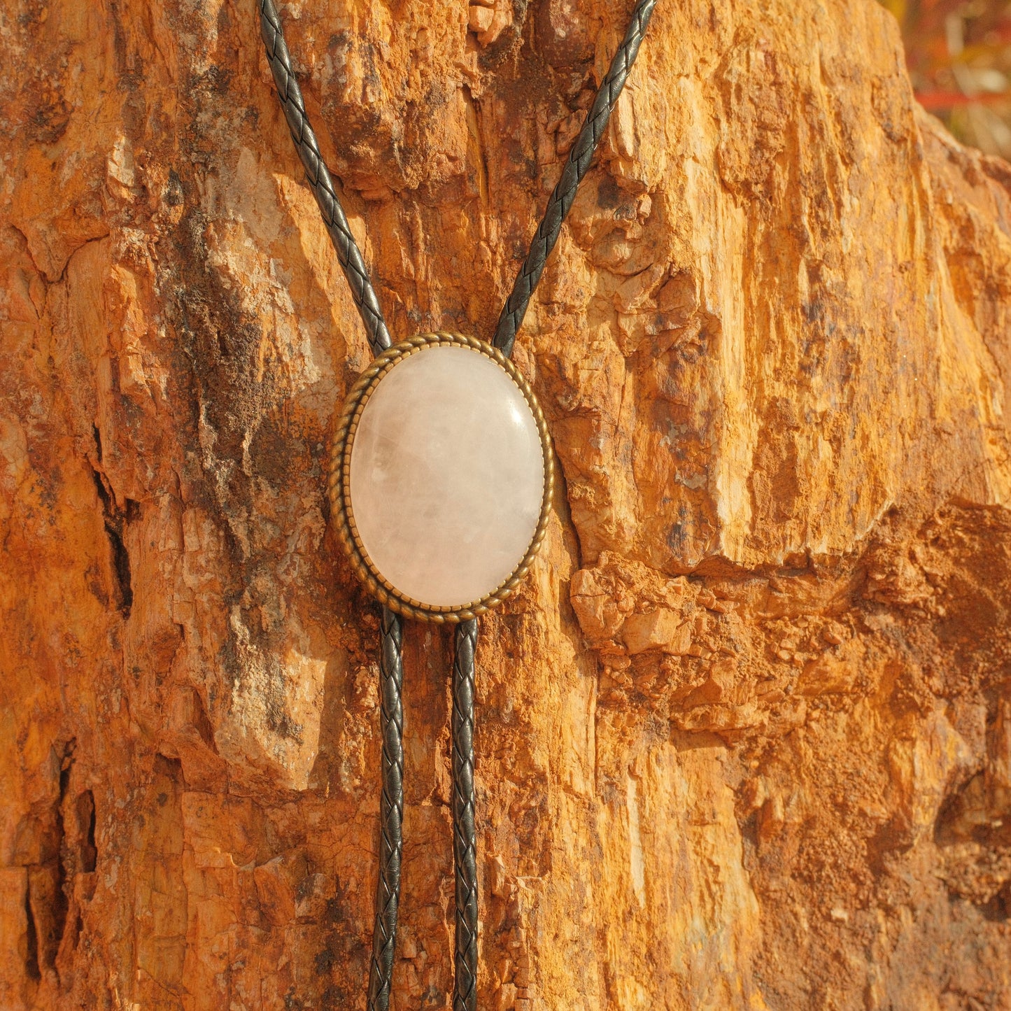223 White Quartz Bolo Tie - “Black Halo”