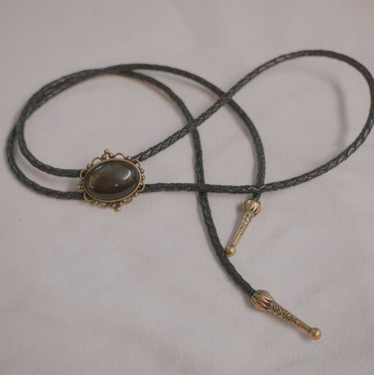 127 Golden Obsidian Bolo Tie - “Shadows of the Past”
