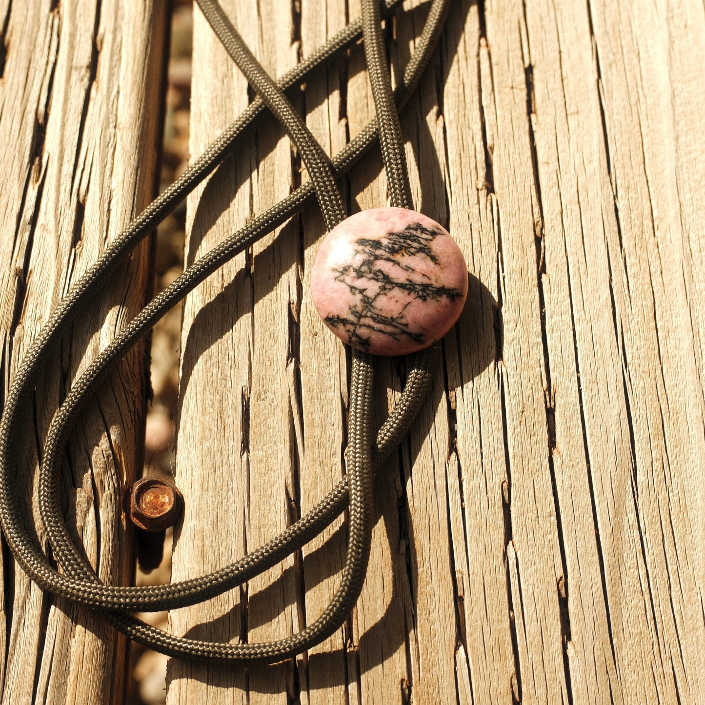 68 Matrix Rhodonite Bolo Tie - “Cinder Lace”